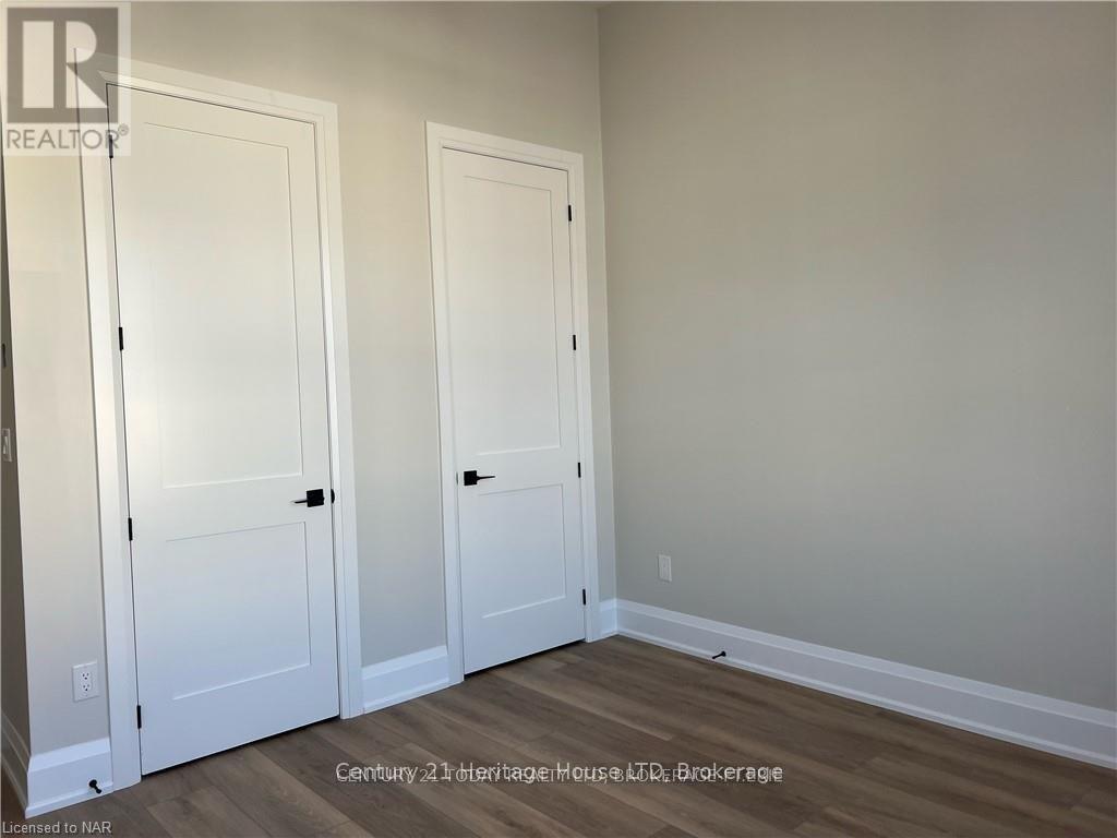 202 - 43 Jarvis Street, Fort Erie, Ontario  L2A 2S3 - Photo 6 - X12230311