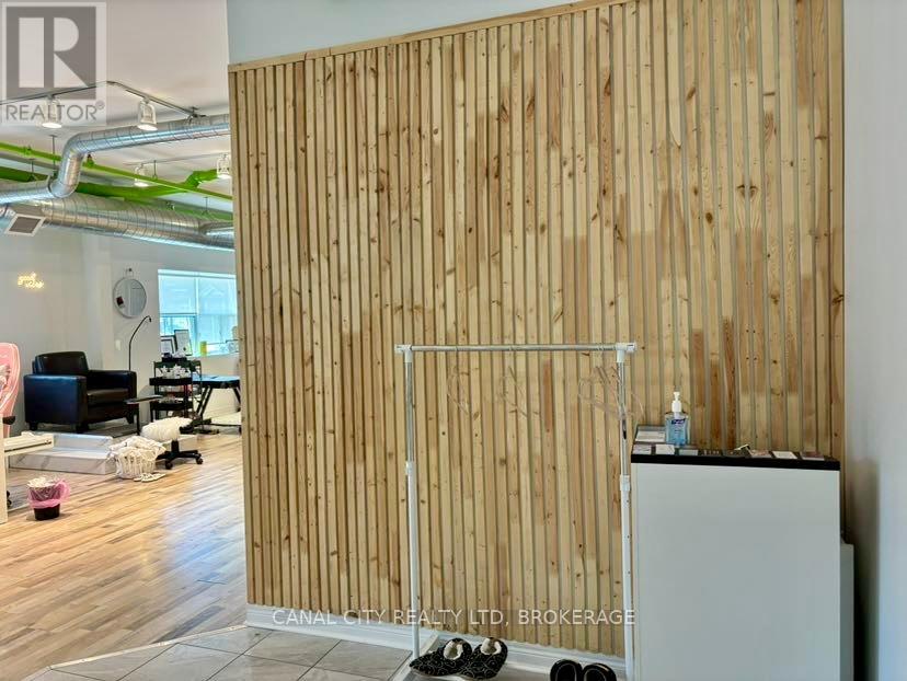 202 - 21 Front Street S, Thorold, Ontario  L2V 1W8 - Photo 2 - X12239286