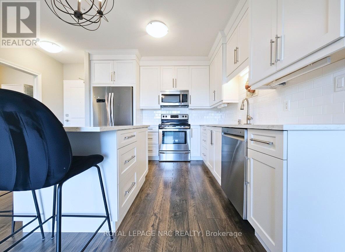 404 - 379 Scott Street, St. Catharines, Ontario  L2M 0B7 - Photo 16 - X12387394