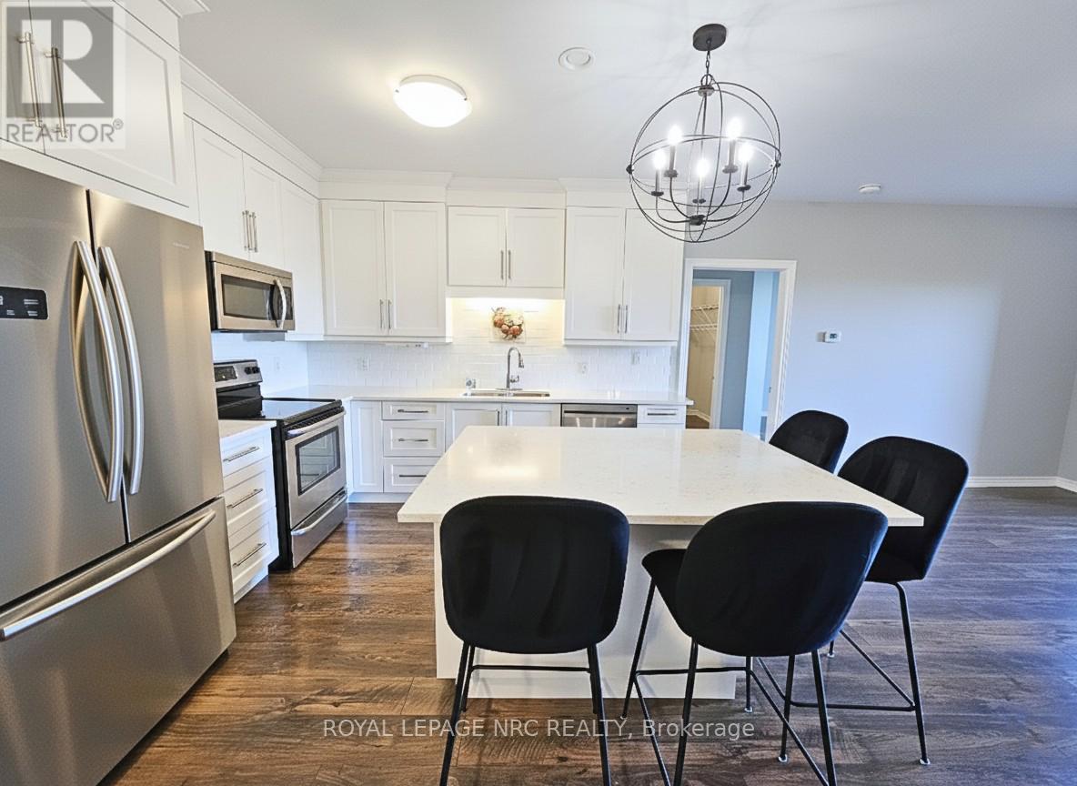 404 - 379 Scott Street, St. Catharines, Ontario  L2M 0B7 - Photo 17 - X12387394