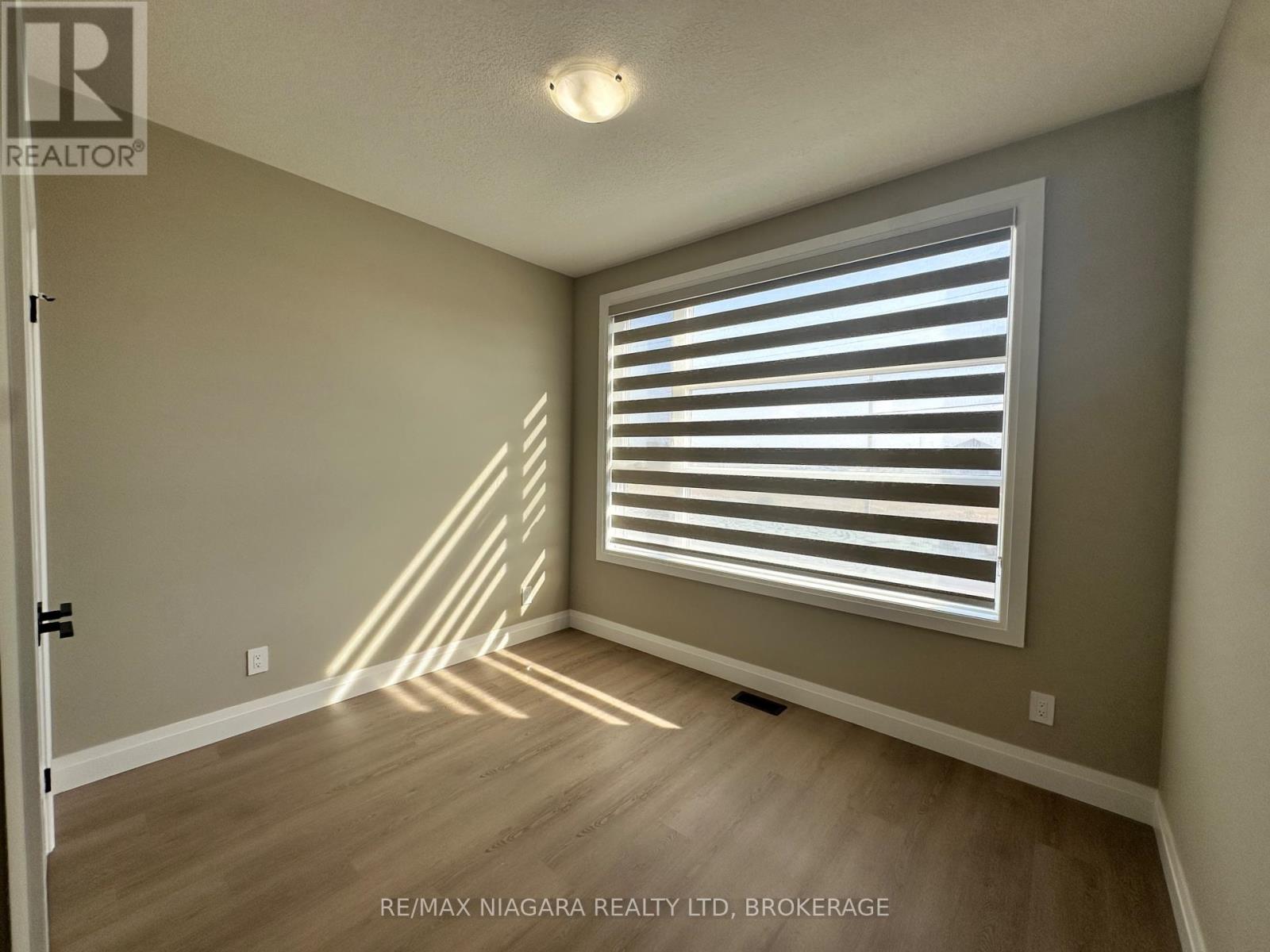 Unit 4 - 17 Keystone Trail, Welland, Ontario  L3B 0N8 - Photo 7 - X12425260