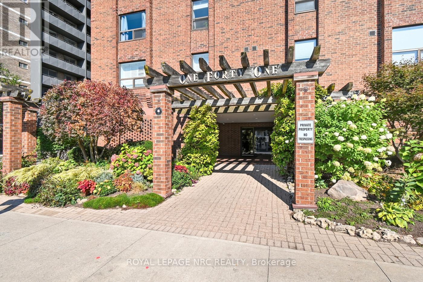 401 - 141 Church Street, St. Catharines, Ontario  L2R 7L7 - Photo 2 - X12438249