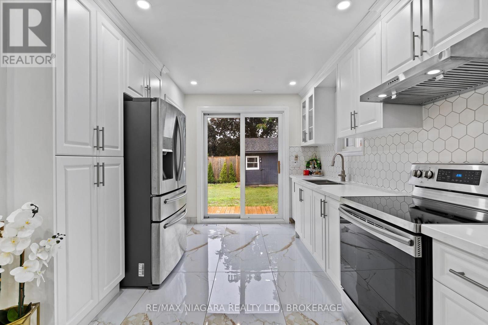 57 Woodrow Street, St. Catharines, Ontario  L2P 2A4 - Photo 13 - X12460892