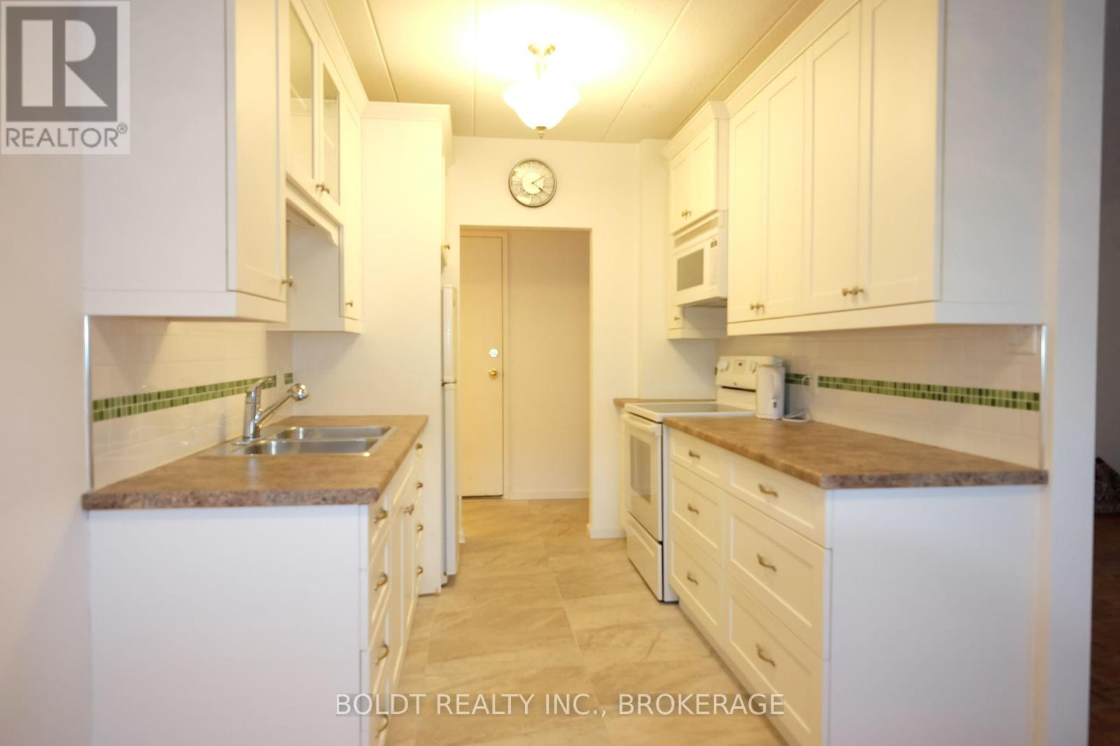 201 - 14 Norris Place, St. Catharines, Ontario  L2R 2W8 - Photo 13 - X12461173