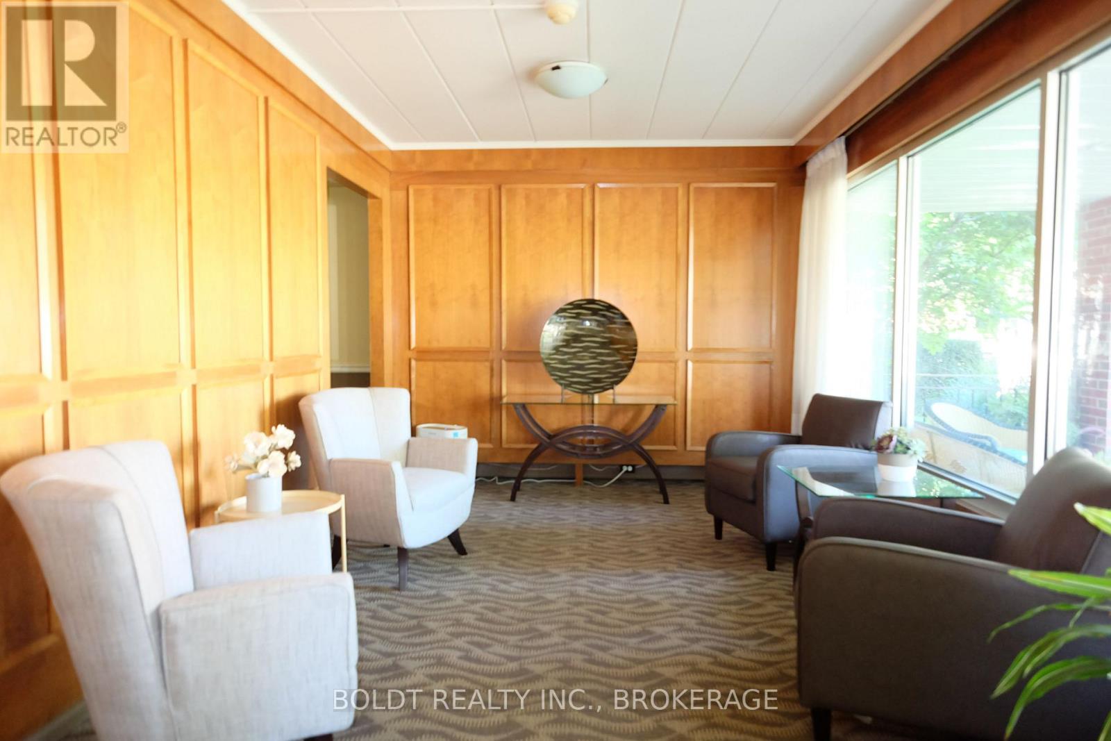 201 - 14 Norris Place, St. Catharines, Ontario  L2R 2W8 - Photo 4 - X12461173