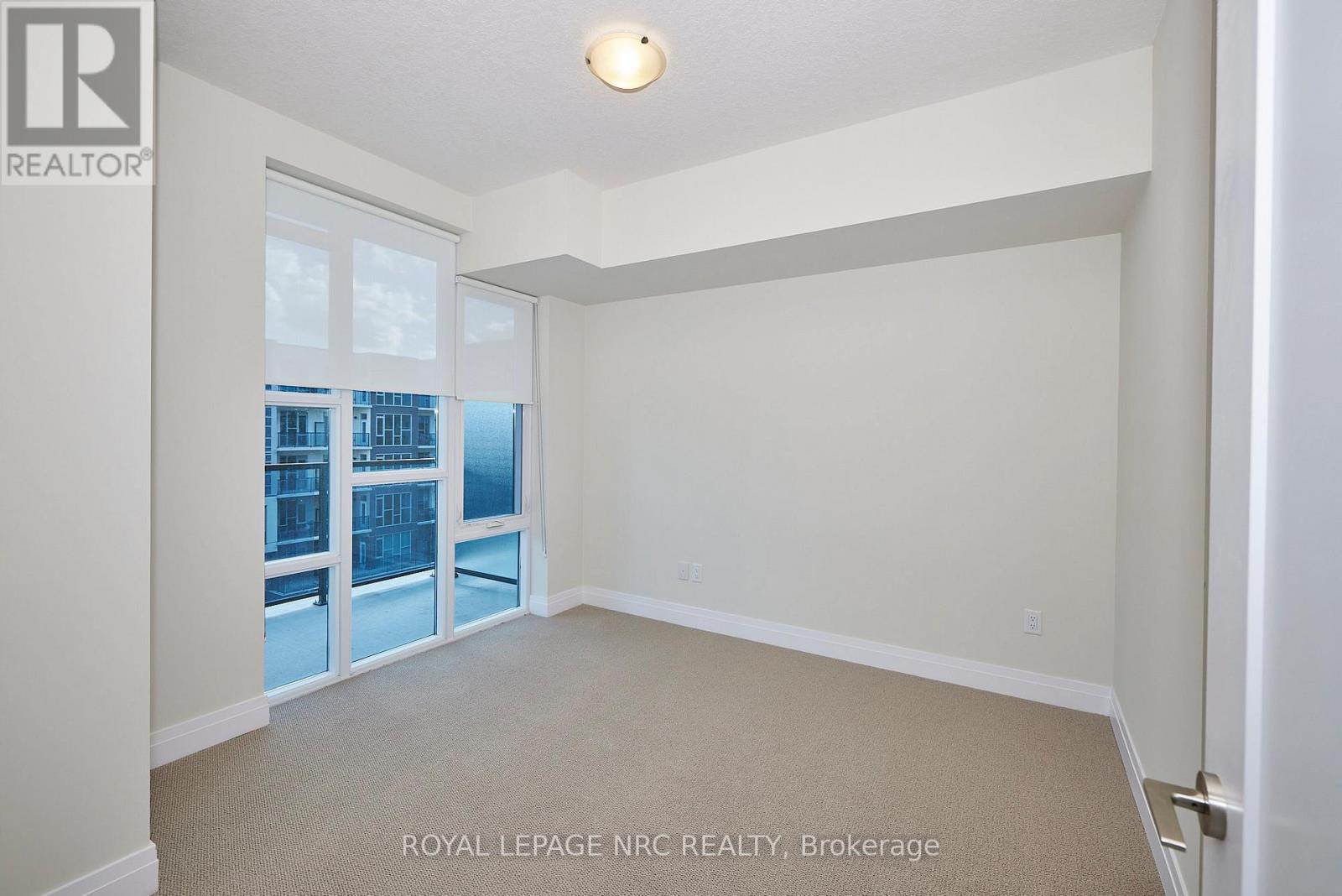 545 - 16 Concord Place, Grimsby, Ontario  L3M 0G7 - Photo 8 - X12570274