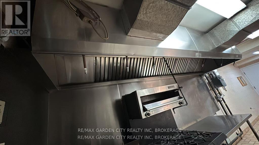 Commercial Unit - 7737 Lundy's Lane, Niagara Falls, Ontario  L2H 1H3 - Photo 3 - X12598578