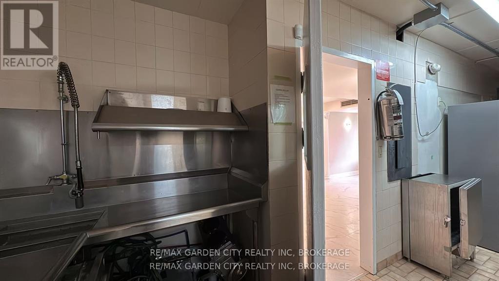 Commercial Unit - 7737 Lundy's Lane, Niagara Falls, Ontario  L2H 1H3 - Photo 5 - X12598578