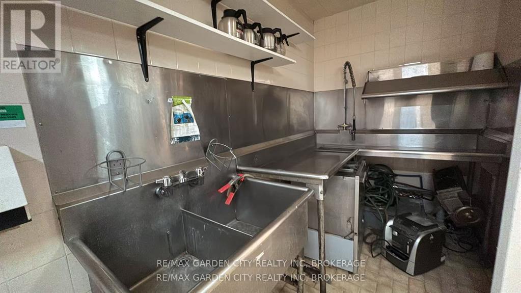 Commercial Unit - 7737 Lundy's Lane, Niagara Falls, Ontario  L2H 1H3 - Photo 6 - X12598578