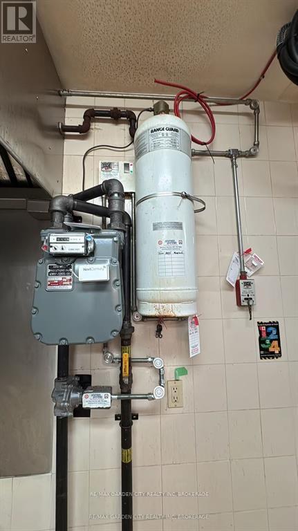 Commercial Unit - 7737 Lundy's Lane, Niagara Falls, Ontario  L2H 1H3 - Photo 9 - X12598578