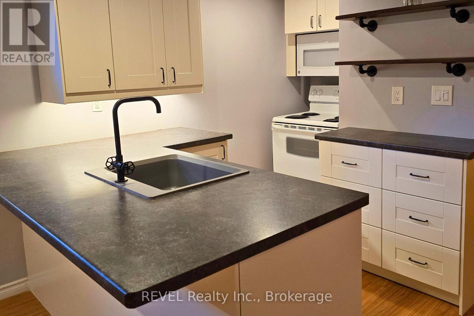 Lower Level - 33 Dundas Crescent, St. Catharines, Ontario  L2T 1T4 - Photo 2 - X12610600