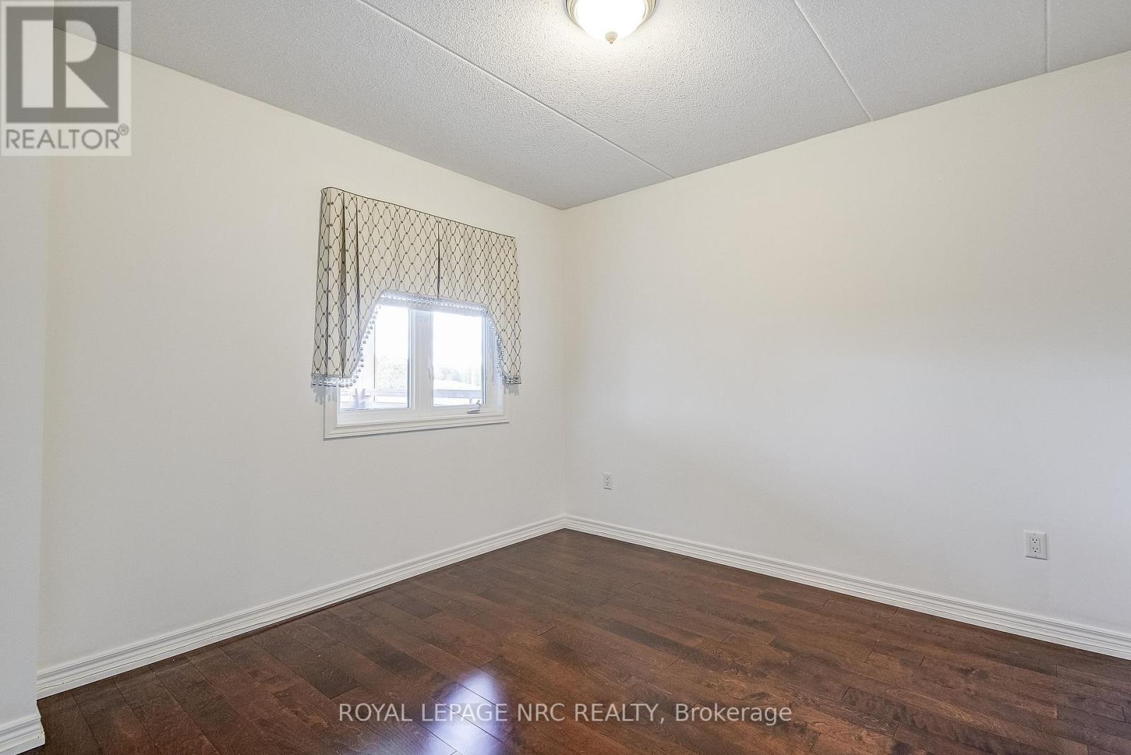 202 - 678 Line 2 Road, Niagara-On-The-Lake, Ontario  L0S 1J0 - Photo 19 - X12880472