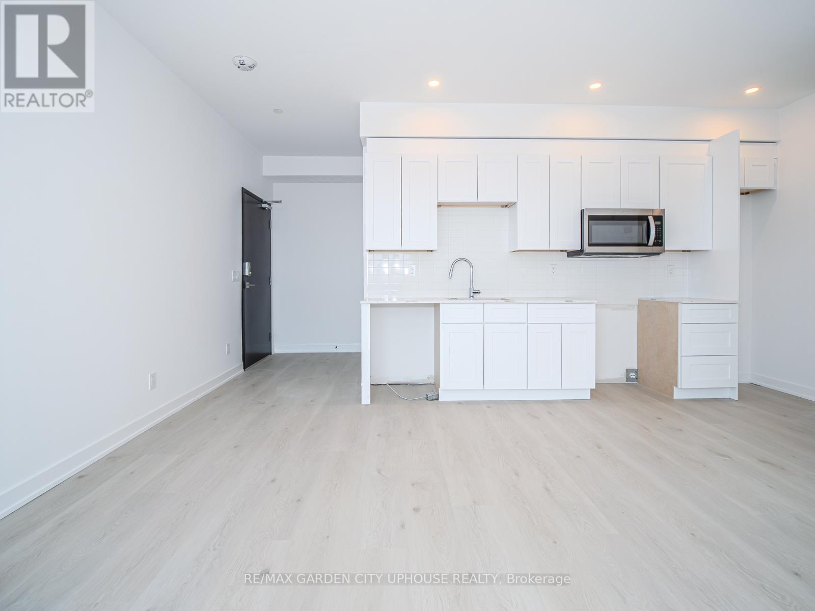 910 - 57 Carlisle Street, St. Catharines, Ontario  L2R 7N6 - Photo 2 - X12881124