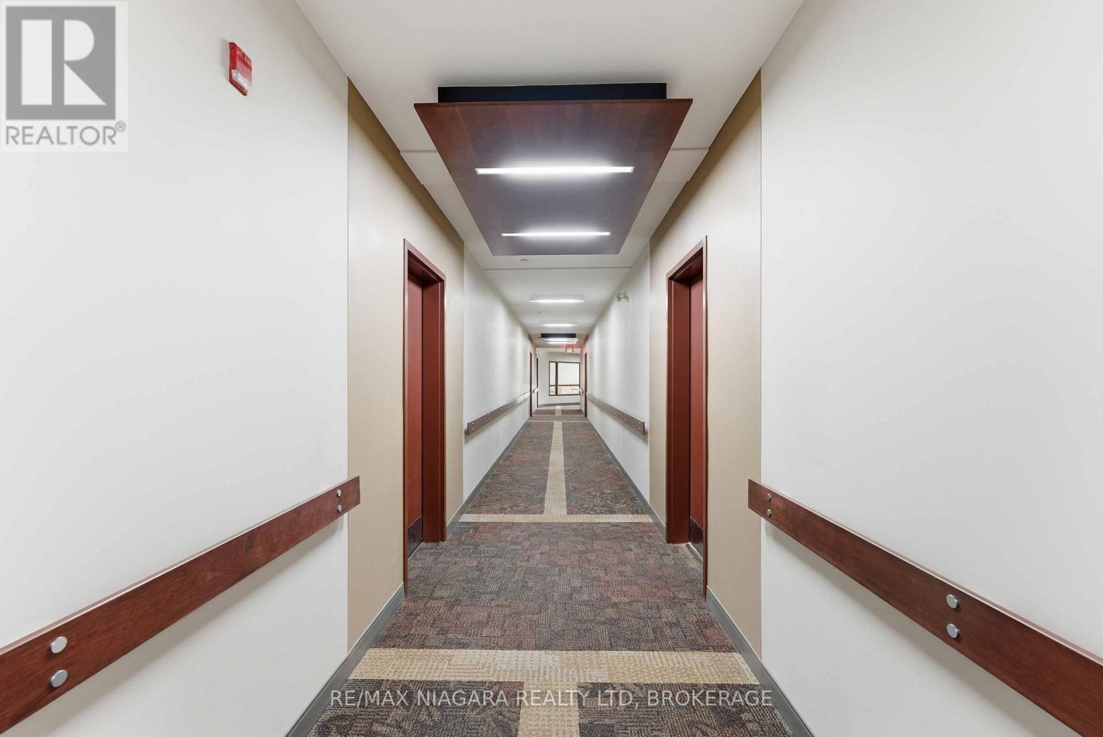 404 - 26 Wellington Street, St. Catharines, Ontario  L2R 5P8 - Photo 4 - X12929028