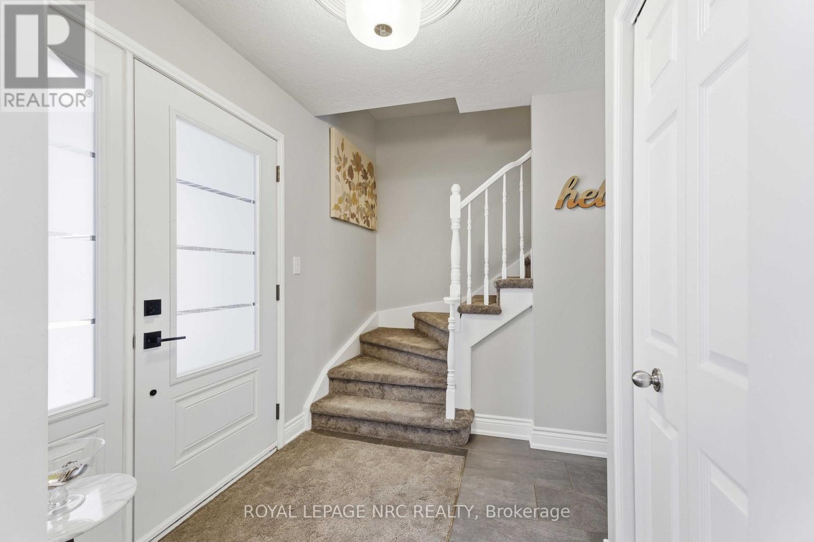 9 Woodgarden Court, St. Catharines, Ontario  L2M 7C9 - Photo 2 - X13443316