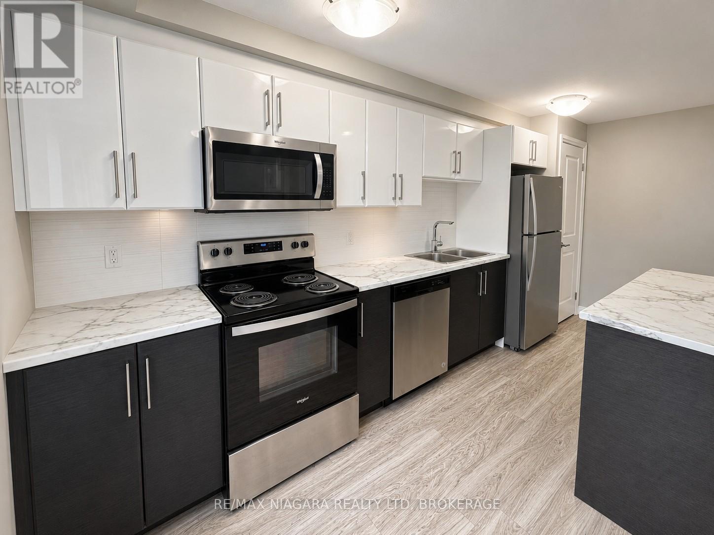 302 - 99 Church Street, St. Catharines, Ontario  L2R 3E1 - Photo 2 - X13528032