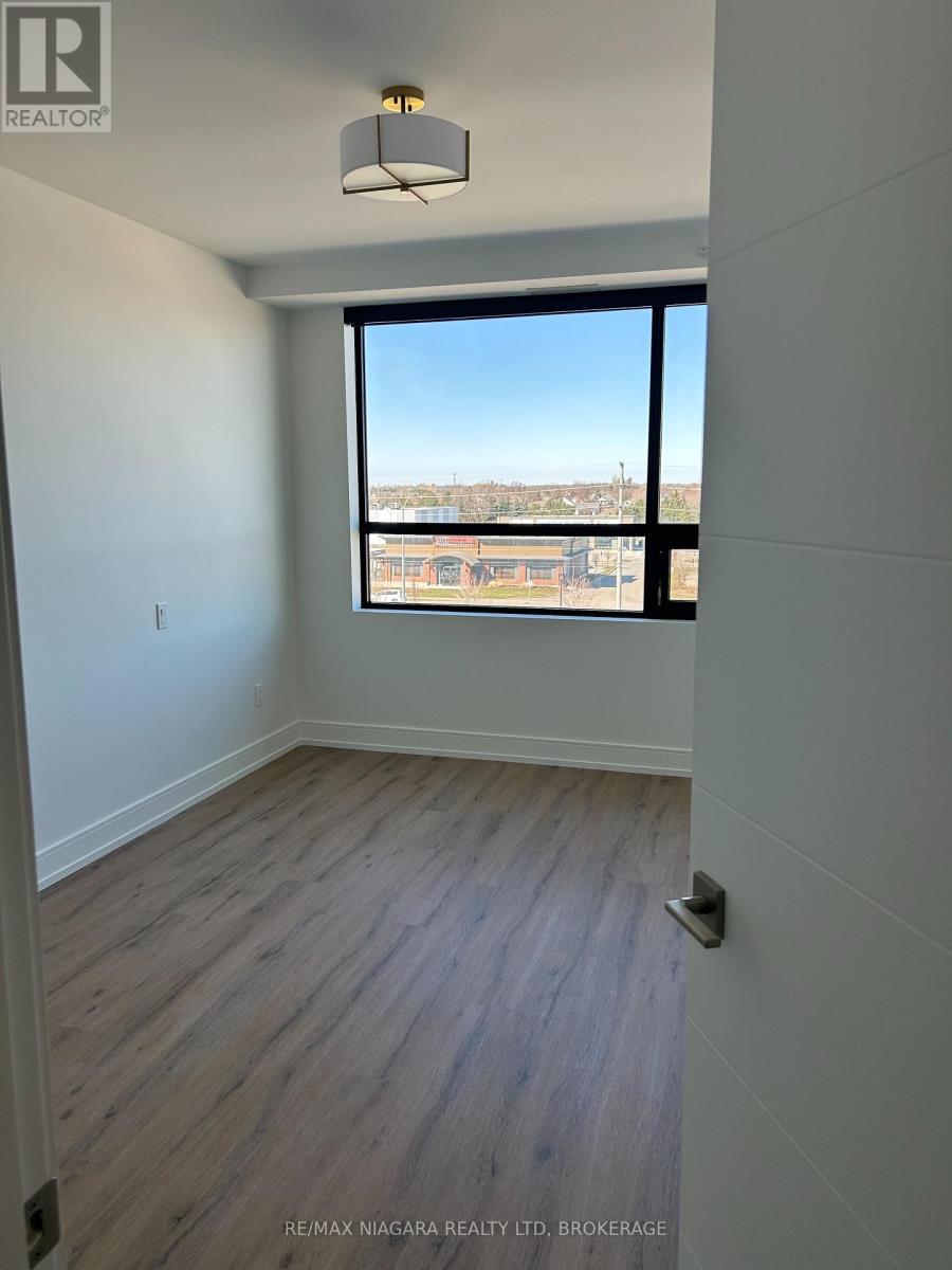 404 - 300 Fourth Avenue, St. Catharines, Ontario  L2R 6P9 - Photo 6 - X13658514